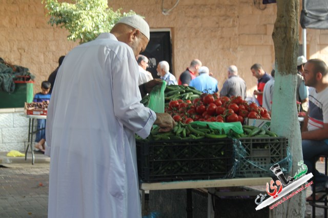 عدسة قسماوي في اليوم الثاني لسوق ميدان ابو بكر   